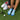 Person putting on light blue socks next to white golf shoes and a club on green grass. A golf ball lies nearby, creating a relaxed, sporty vibe.